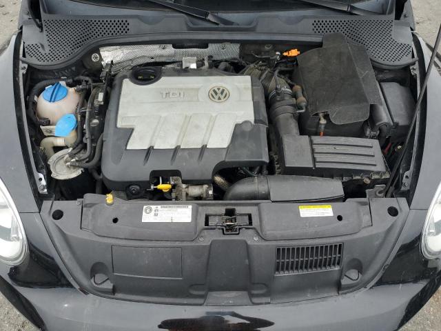 Photo 11 from auction – 2014 VOLKSWAGEN BEETLE with VIN 3VW5L7AT5EM816959