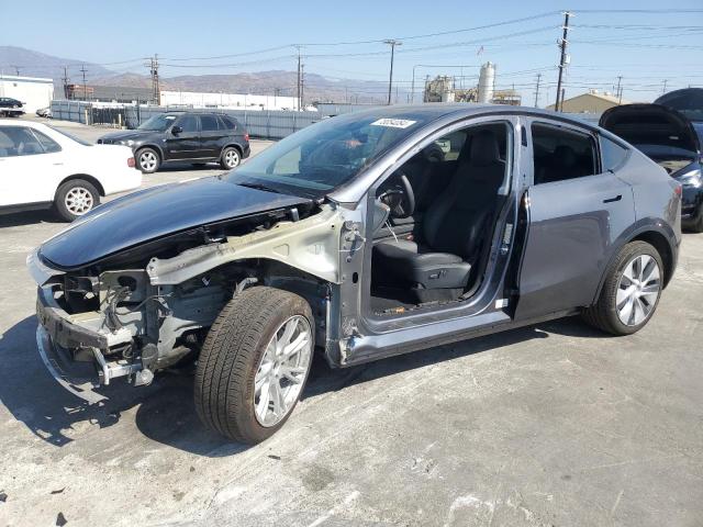 TESLA MODEL Y 2023 with VIN 7SAYGDEE1PF938372 - Photo from auction