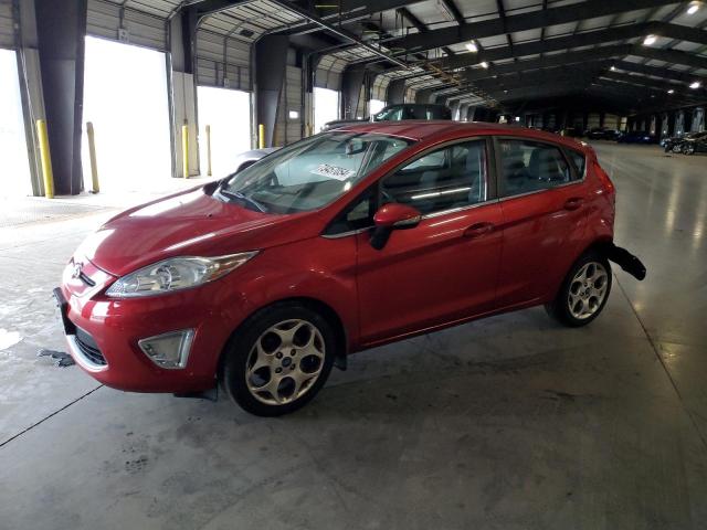 FORD FIESTA SES 2011 with VIN 3FADP4FJ5BM219157 - Photo from auction