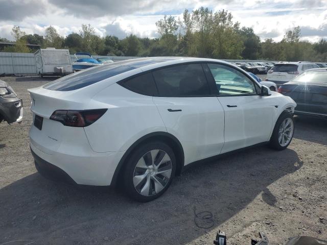 Photo 3 from auction – 2023 TESLA MODEL Y with VIN 7SAYGAEE3PF612040