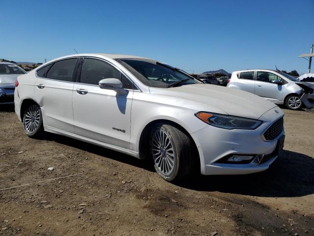 Photo 4 from auction – 2018 FORD FUSION TIT with VIN 3FA6P0RU2JR145432