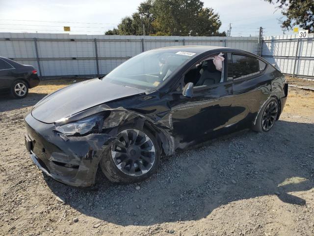 TESLA MODEL Y 2023 with VIN 7SAYGAEE2PF627225 - Photo from auction