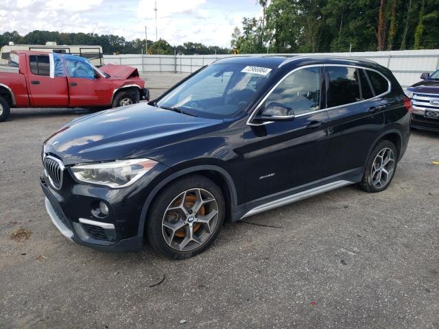 BMW X1 XDRIVE2 2016 with VIN WBXHT3C37GP883844 - Photo from auction
