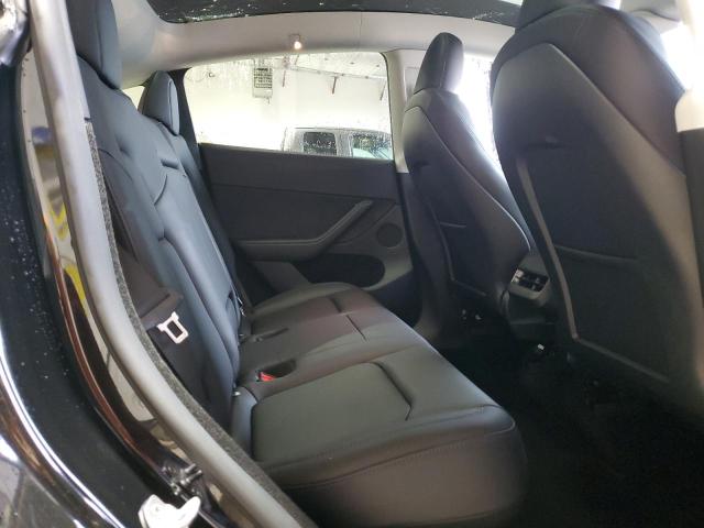 Photo 11 from auction – 2023 TESLA MODEL Y with VIN 7SAYGDEF8PF808534