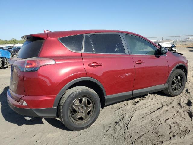 Photo 3 from auction – 2018 TOYOTA RAV4 LE with VIN 2T3ZFREV5JW474294