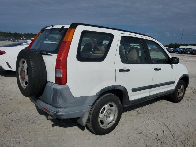 Photo 3 from auction – 2002 HONDA CR-V LX with VIN JHLRD68402C012515