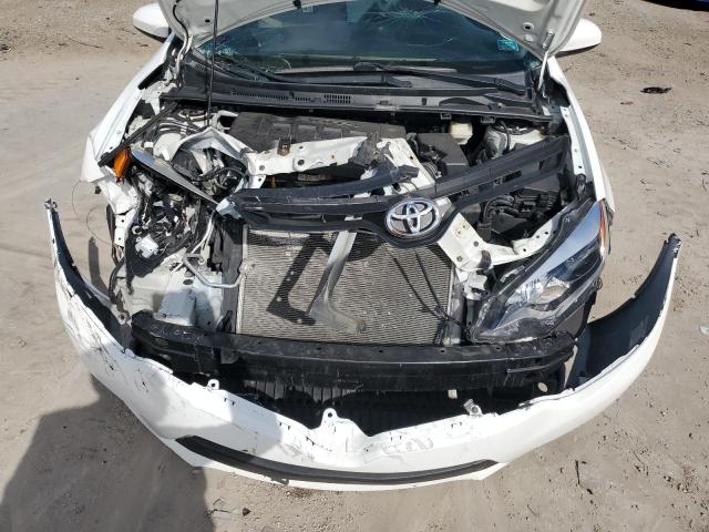 Photo 11 from auction – 2015 TOYOTA COROLLA L with VIN 2T1BURHEXFC344287
