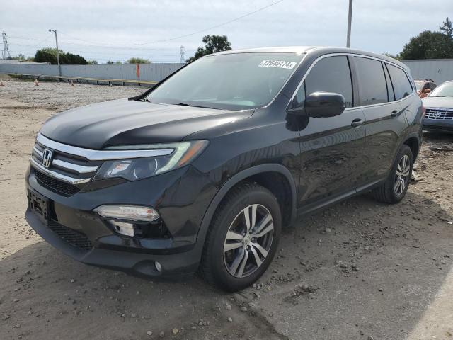 HONDA PILOT EXL 2018 with VIN 5FNYF6H50JB047598 - Photo from auction