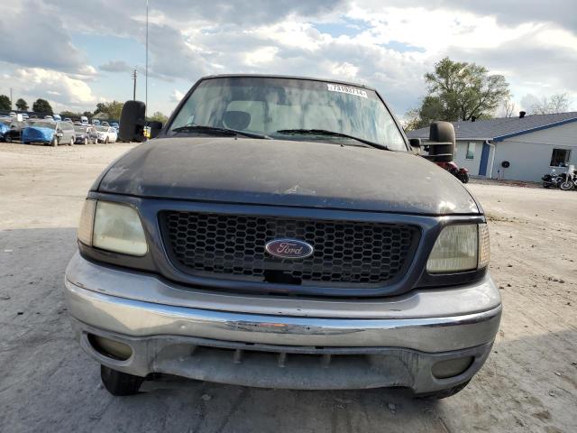 Photo 5 from auction – 2001 FORD F150 with VIN 1FTRX18W61NB88870