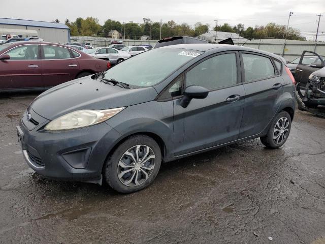 FORD FIESTA SE 2011 with VIN 3FADP4EJ9BM115465 - Photo from auction