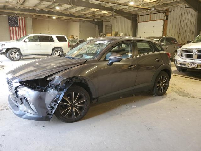 MAZDA CX-3 TOURI 2018 with VIN JM1DKFC71J1307857 - Photo from auction