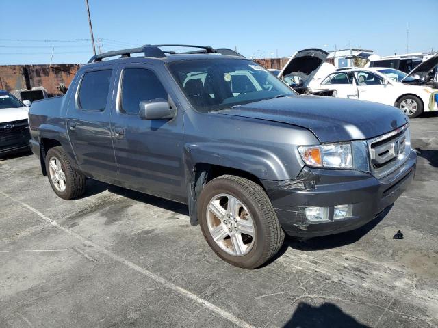 Photo 4 from auction – 2010 HONDA RIDGELINE with VIN 5FPYK1F52AB009332