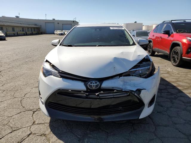Photo 5 from auction – 2018 TOYOTA COROLLA L with VIN 5YFBURHE6JP784189