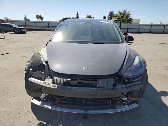 Photo 5 from auction – 2022 TESLA MODEL 3 with VIN 5YJ3E1EB3NF308044