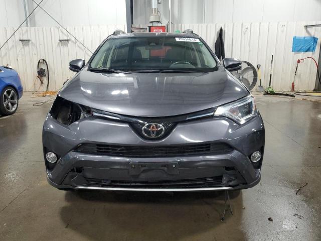 Photo 5 from auction – 2017 TOYOTA RAV4 XLE with VIN JTMRFREV4HJ173301