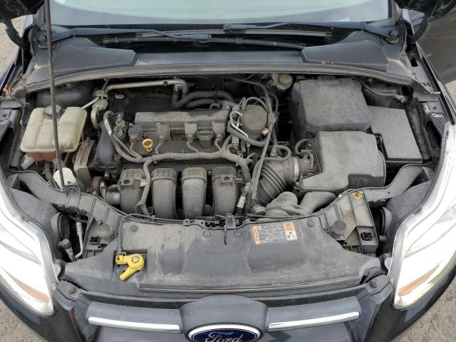 Photo 11 from auction – 2014 FORD FOCUS SE with VIN 1FADP3F27EL302498