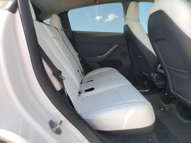 Photo 11 from auction – 2023 TESLA MODEL Y with VIN 7SAYGDEE6PA162012