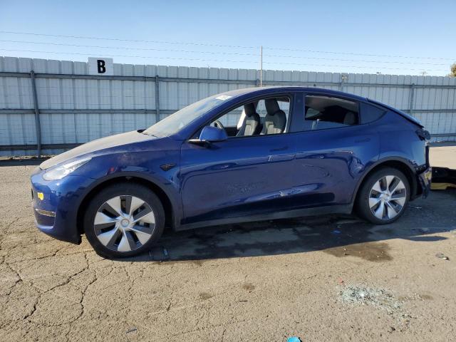 TESLA MODEL Y 2021 with VIN 5YJYGAEE7MF297042 - Photo from auction