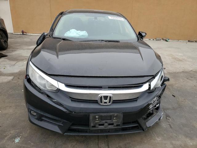 Photo 5 from auction – 2017 HONDA CIVIC EXL with VIN 2HGFC1F70HH656140