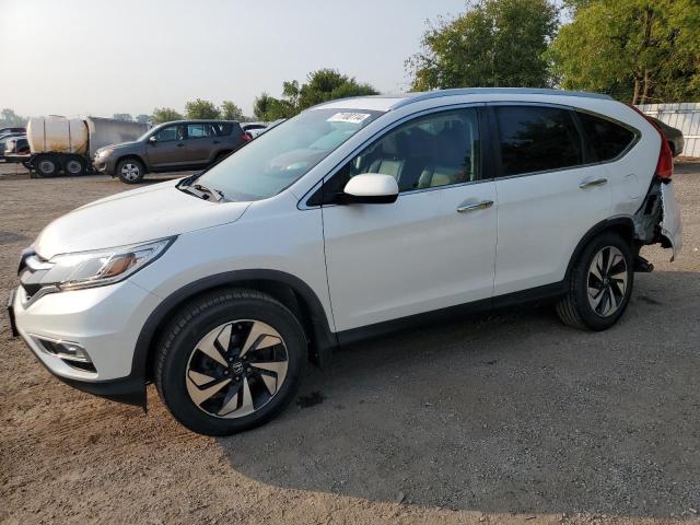 HONDA CR-V TOURI 2016 with VIN 5J6RM4H98GL802241 - Photo from auction