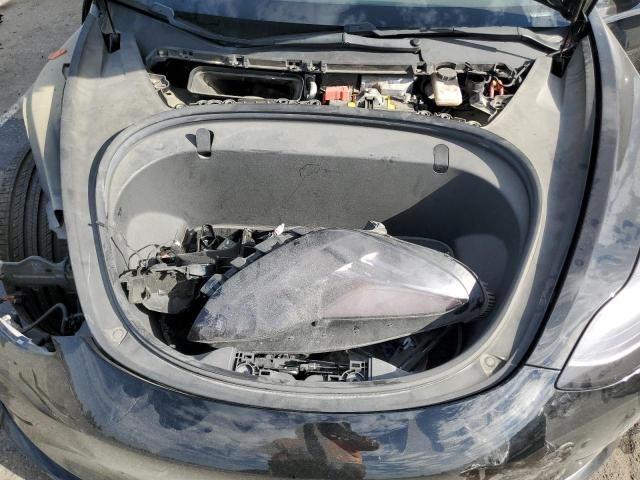 Photo 11 from auction – 2018 TESLA MODEL 3 with VIN 5YJ3E1EA1JF013932