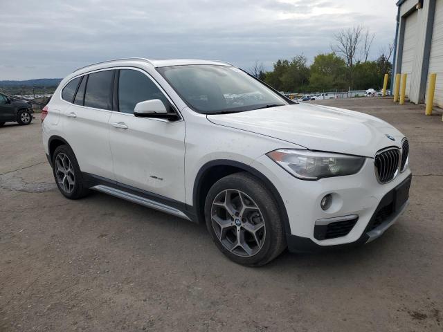 Photo 4 from auction – 2017 BMW X1 XDRIVE2 with VIN WBXHT3C3XH5F82646