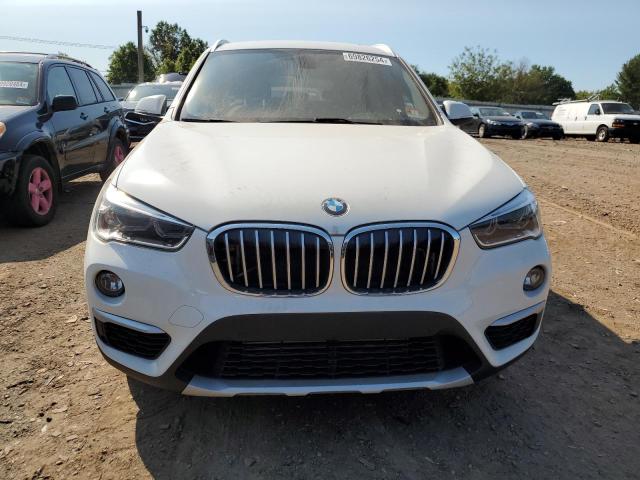 Photo 5 from auction – 2017 BMW X1 XDRIVE2 with VIN WBXHT3C30H5F79951