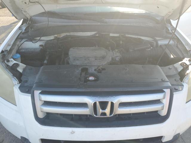 Photo 12 from auction – 2006 HONDA PILOT EX with VIN 2HKYF18796H551502