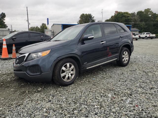 KIA SORENTO LX 2013 with VIN 5XYKTCA65DG326056 - Photo from auction