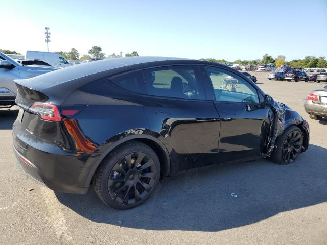Photo 3 from auction – 2022 TESLA MODEL Y with VIN 7SAYGDEE7NF448371