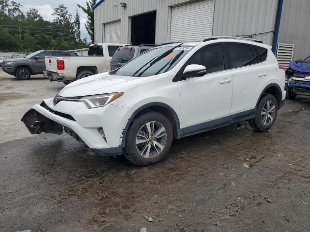 TOYOTA RAV4 XLE 2017 with VIN JTMWFREVXHD092983 - Photo from auction