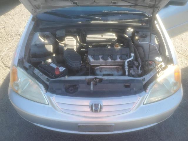 Photo 11 from auction – 2003 HONDA CIVIC LX with VIN 2HGES16553H511598