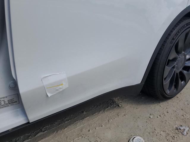 Photo 12 from auction – 2022 TESLA MODEL Y with VIN 7SAYGDEF3NF452541