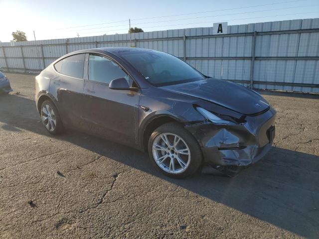 Photo 4 from auction – 2023 TESLA MODEL Y with VIN 7SAYGDED9PF967321