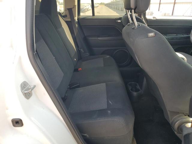 Photo 11 from auction – 2015 JEEP COMPASS SP with VIN 1C4NJCBA4FD273390
