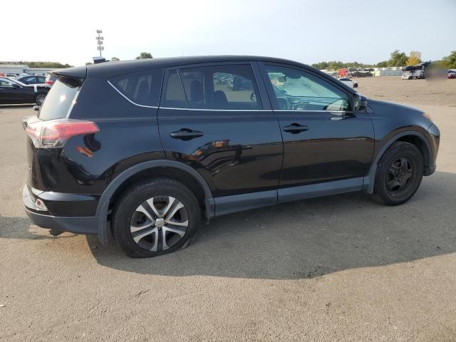 Photo 3 from auction – 2018 TOYOTA RAV4 LE with VIN 2T3BFREV6JW843181