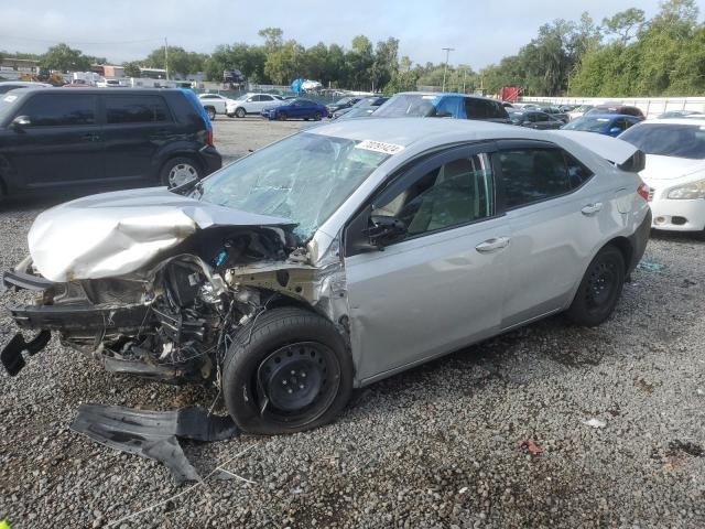 TOYOTA COROLLA L 2014 with VIN 5YFBURHE9EP126288 - Photo from auction