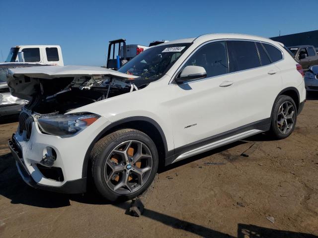 BMW X1 XDRIVE2 2018 with VIN WBXHT3C32J5K32267 - Photo from auction