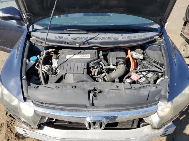 Photo 11 from auction – 2006 HONDA CIVIC HYBR with VIN JHMFA36276S024339