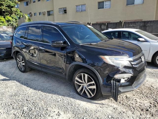 Photo 4 from auction – 2017 HONDA PILOT ELIT with VIN 5FNYF6H00HB055277