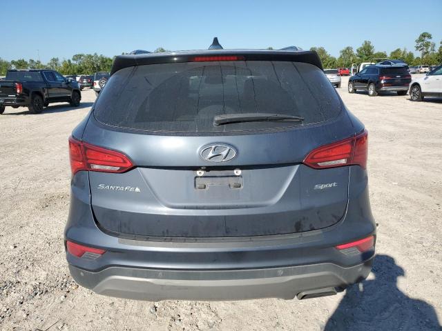 Photo 6 from auction – 2017 HYUNDAI SANTA FE S with VIN 5NMZU3LB3HH047044