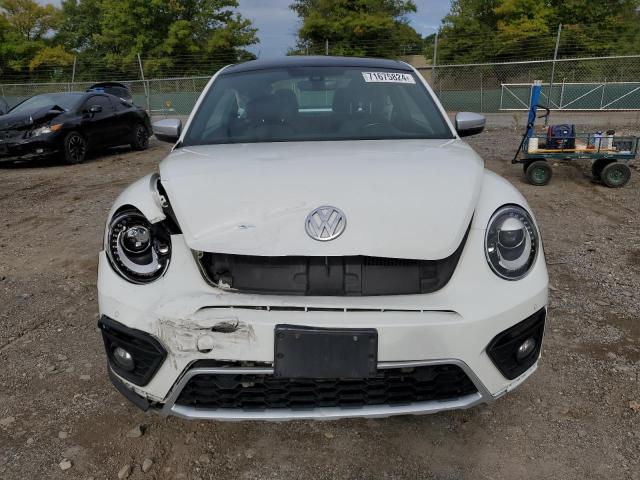 Photo 5 from auction – 2018 VOLKSWAGEN BEETLE DUN with VIN 3VWSD7AT1JM706856