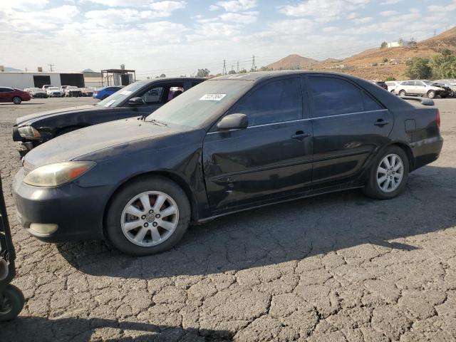 TOYOTA CAMRY LE 2002 with VIN 4T1BF30K02U001537 - Photo from auction