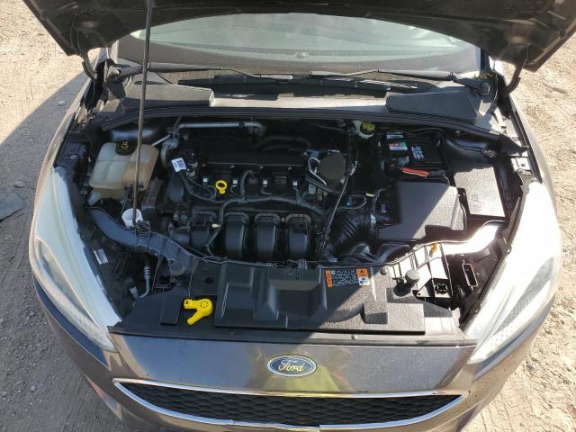 Photo 11 from auction – 2015 FORD FOCUS SE with VIN 1FADP3F24FL300029