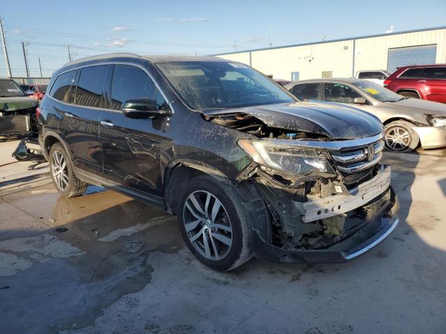 Photo 4 from auction – 2016 HONDA PILOT ELIT with VIN 5FNYF6H05GB028087