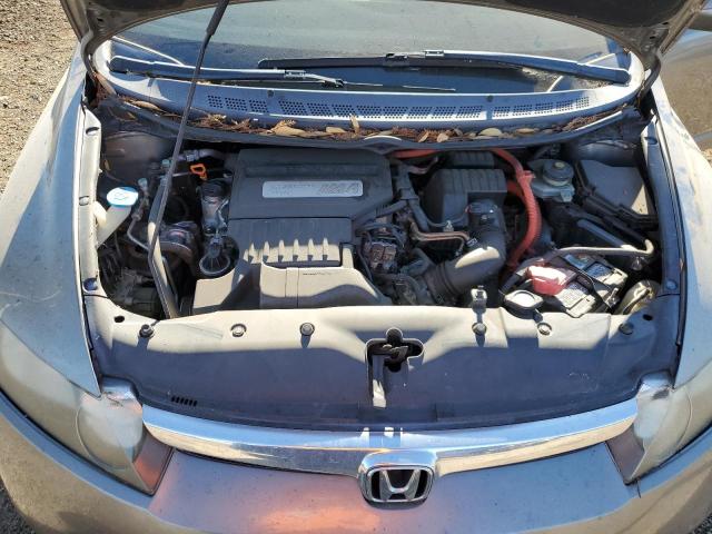 Photo 11 from auction – 2006 HONDA CIVIC HYBR with VIN JHMFA36296S009731