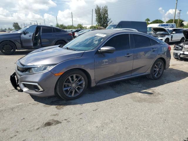 HONDA CIVIC EX 2021 with VIN 19XFC1F30ME001087 - Photo from auction