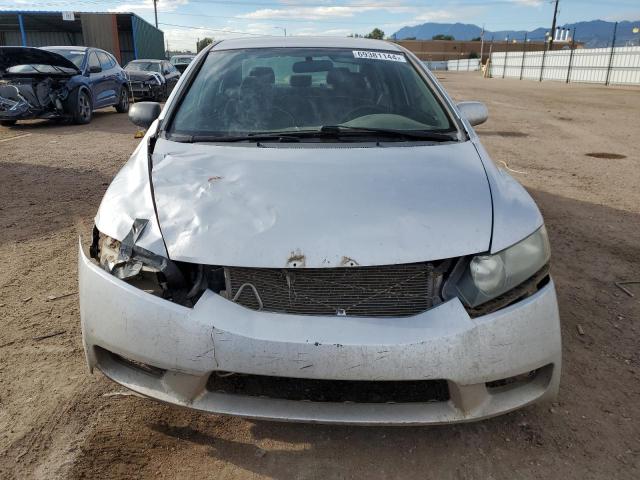 Photo 5 from auction – 2011 HONDA CIVIC LX with VIN 19XFA1E5XBE038685