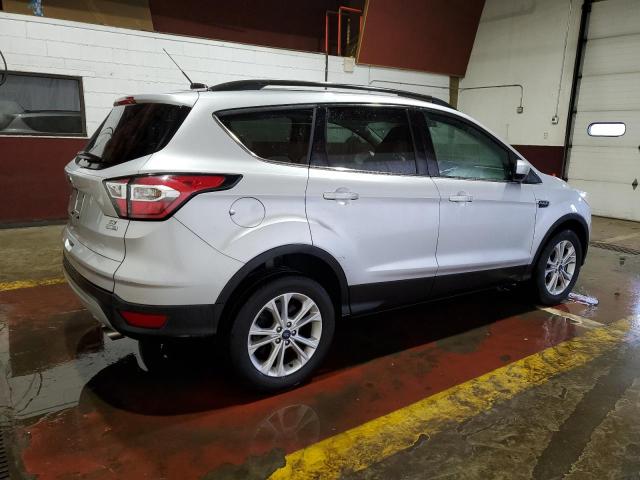 Photo 3 from auction – 2018 FORD ESCAPE SE with VIN 1FMCU9GD5JUA32768