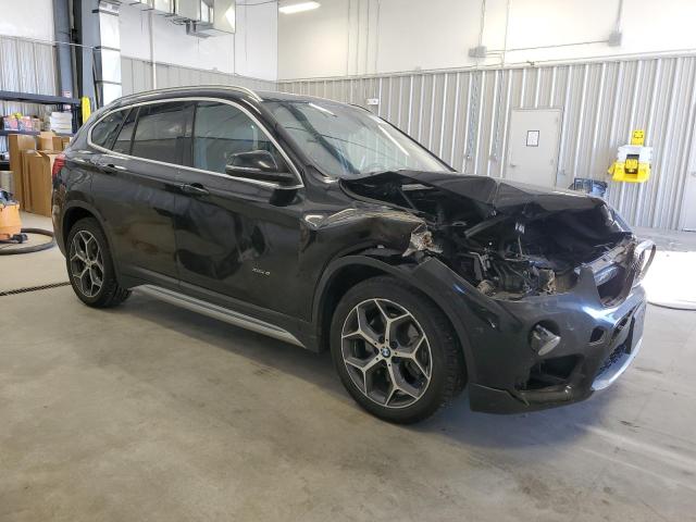 Photo 4 from auction – 2017 BMW X1 XDRIVE2 with VIN WBXHT3C31H5F80767